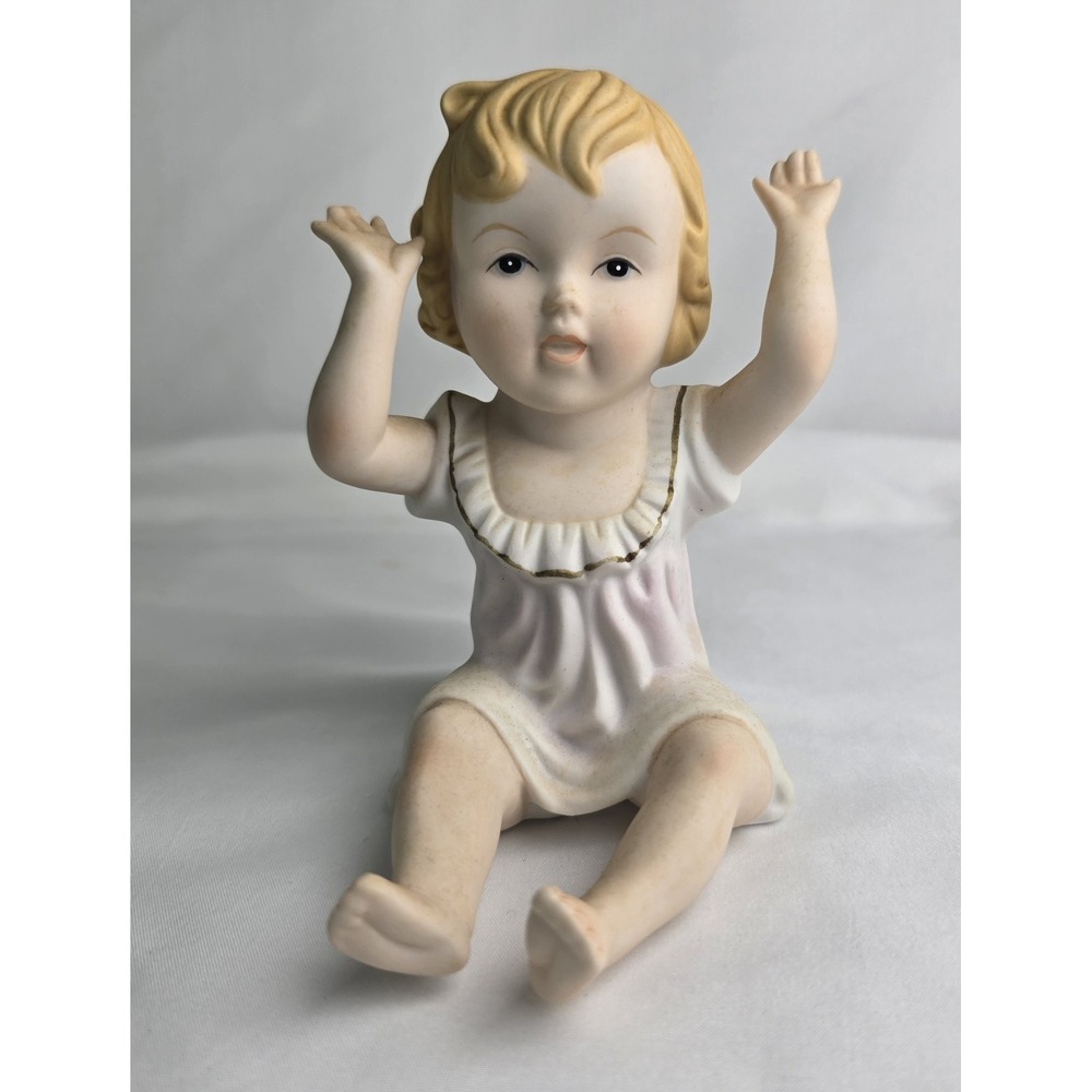 Vintage Bisque Porcelain Piano Baby Figurine Sitting with Her Arms Up 4 3/" Tall